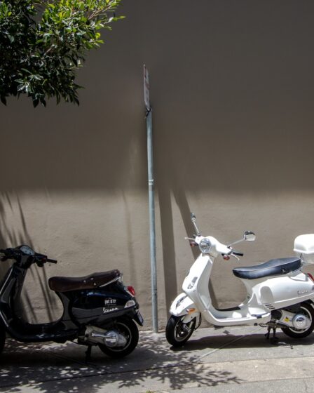 black and white motor scooter